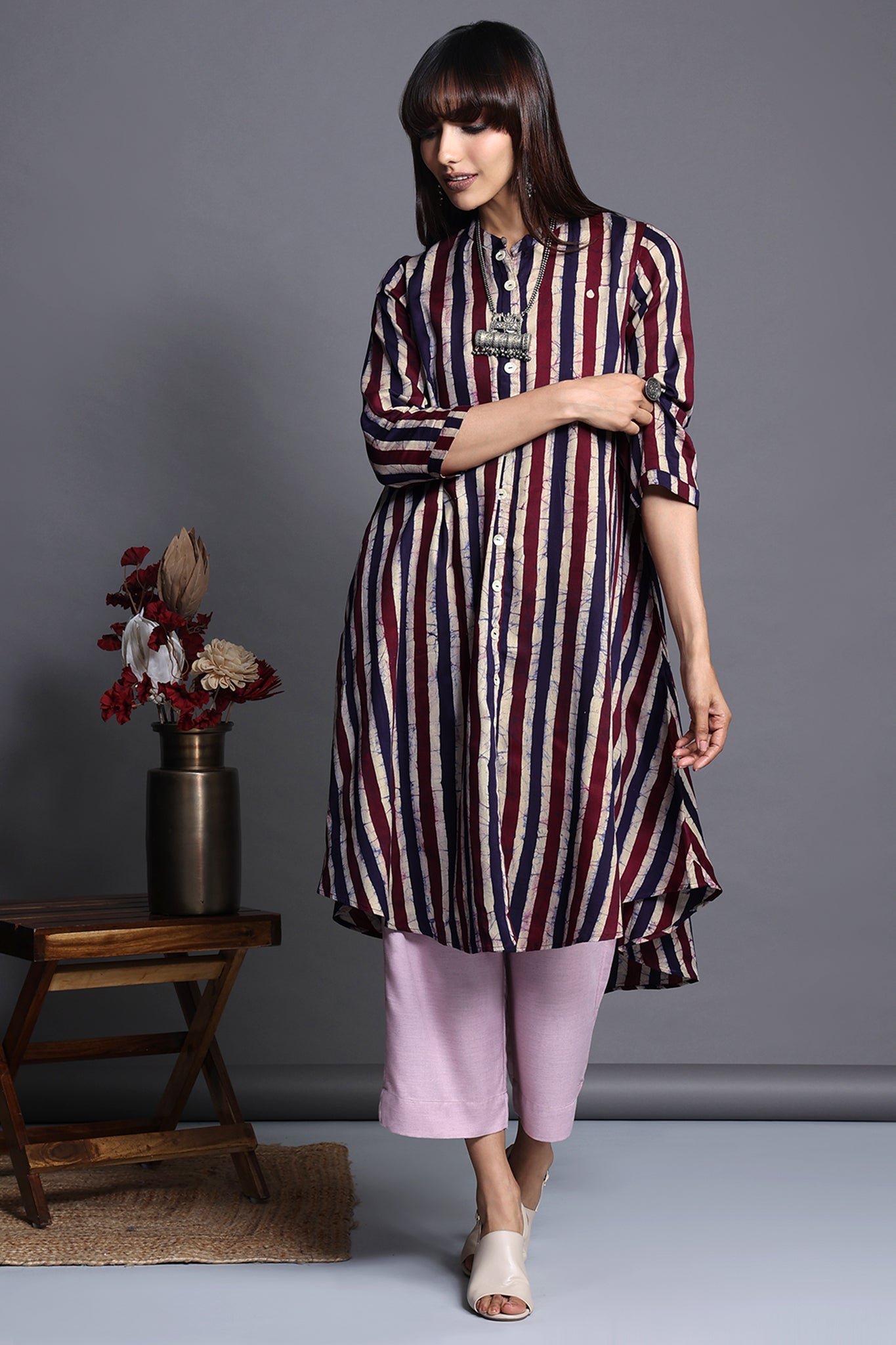 Asymmetric apple cut round knee length hemline   button down kurta  with pockets purple blue stripes in batik satin fabric  