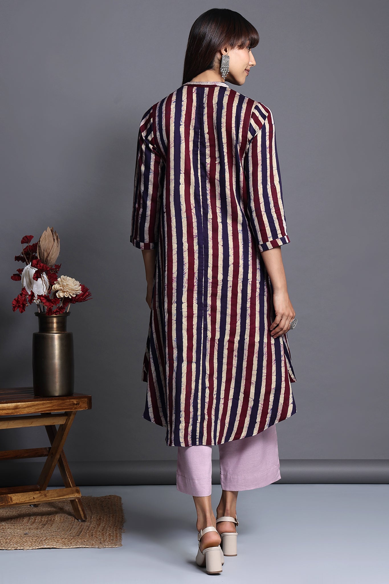 Asymmetric apple cut round knee length hemline button down kurta  with pockets purple blue stripes in batik satin fabric  