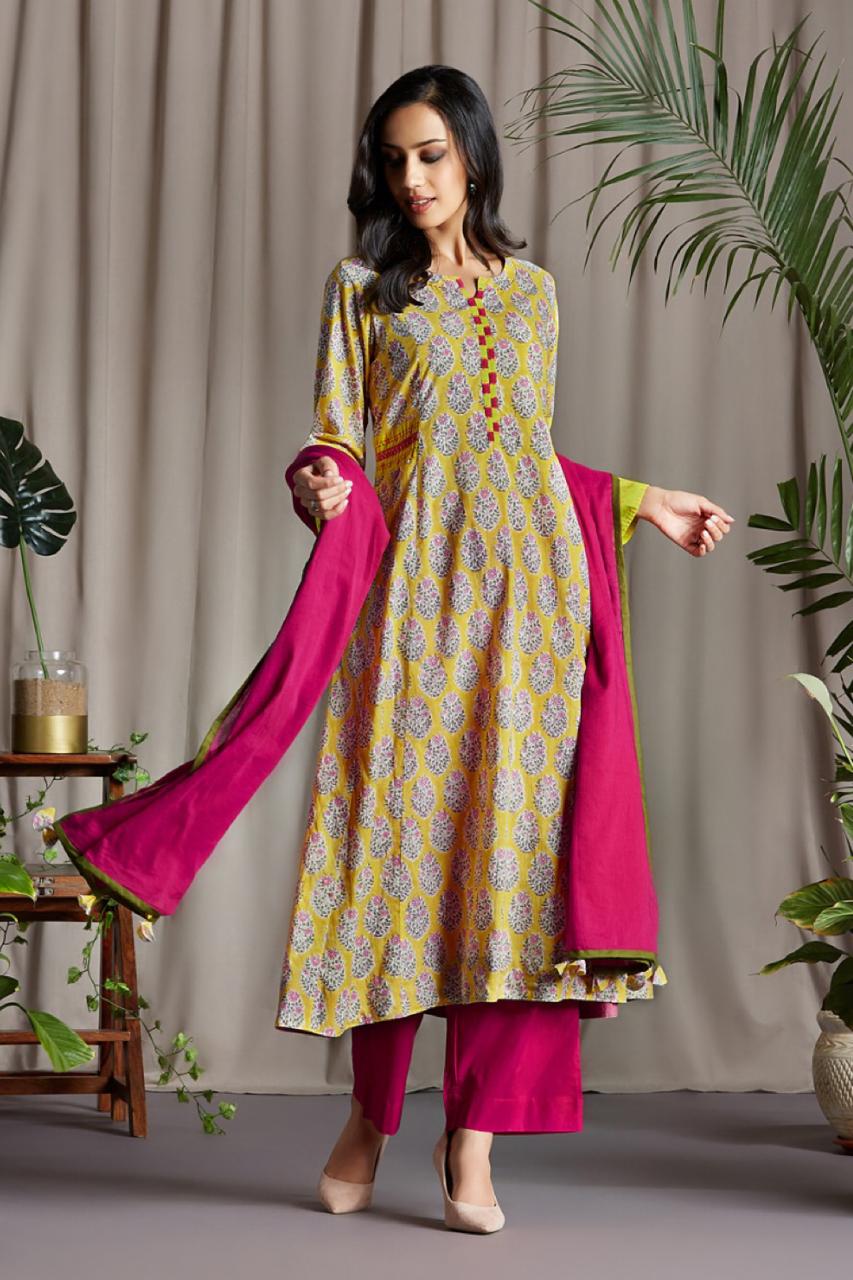 Bright Yellow Floral Buta Anarkali with Handloom Ikat Patti Side patti and Sleeve Cuff with Mashru Silk handmade Potli buttons and hand embroidery on Neck Patti and Side trims with Pink Mul Dupatta