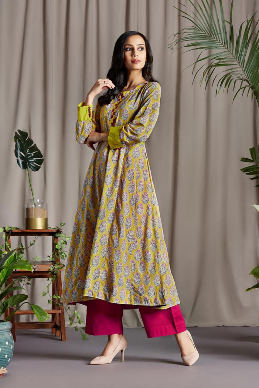 Bright Yellow Floral Buta Anarkali with Handloom Ikat Patti Side patti and Sleeve Cuff with Mashru Silk handmade Potli buttons and hand embroidery on Neck Patti and Side trims with Pink Mul Dupatta